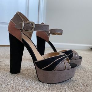Pink, grey, black Lauren Conrad platform heels.